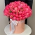 Композиция в шляпной коробке из 113 пионов Корал Шарм в Долгопрудном