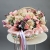 Композиция в корзине "Диодора" из французских роз Квиксенд, диантусов и кустовых пионовидных роз Бомбастик в Долгопрудном